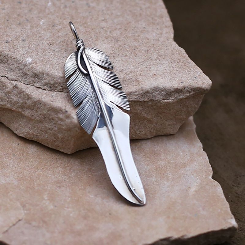 Uniquely shaped feather pendant