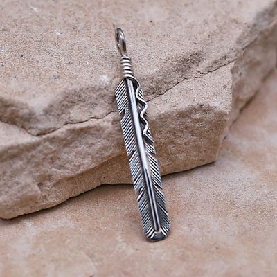 Long thin feather pendant