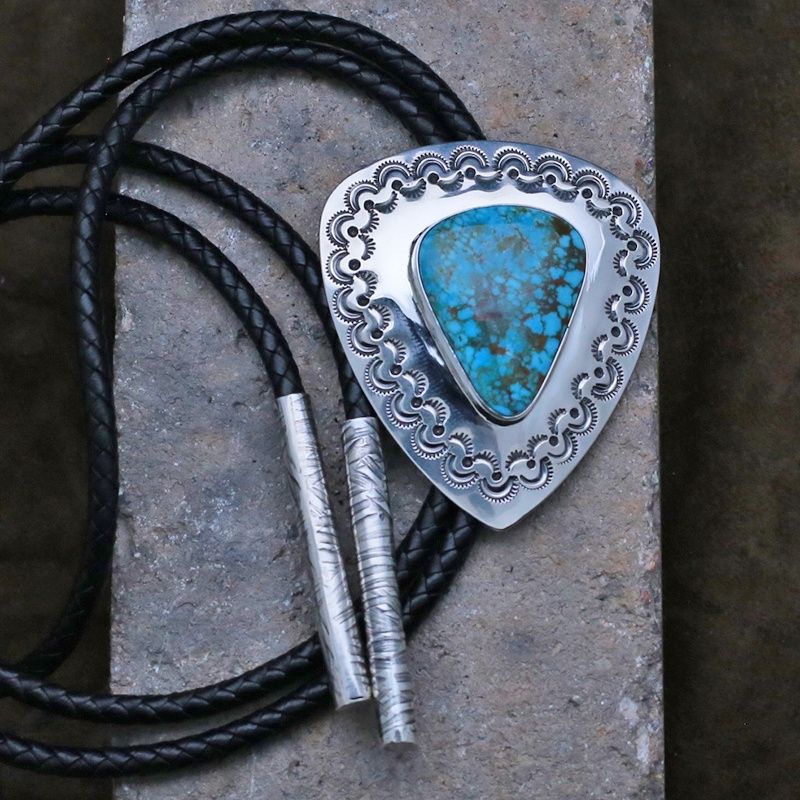 Kingman turquoise bolo tie by artist Travis Teller