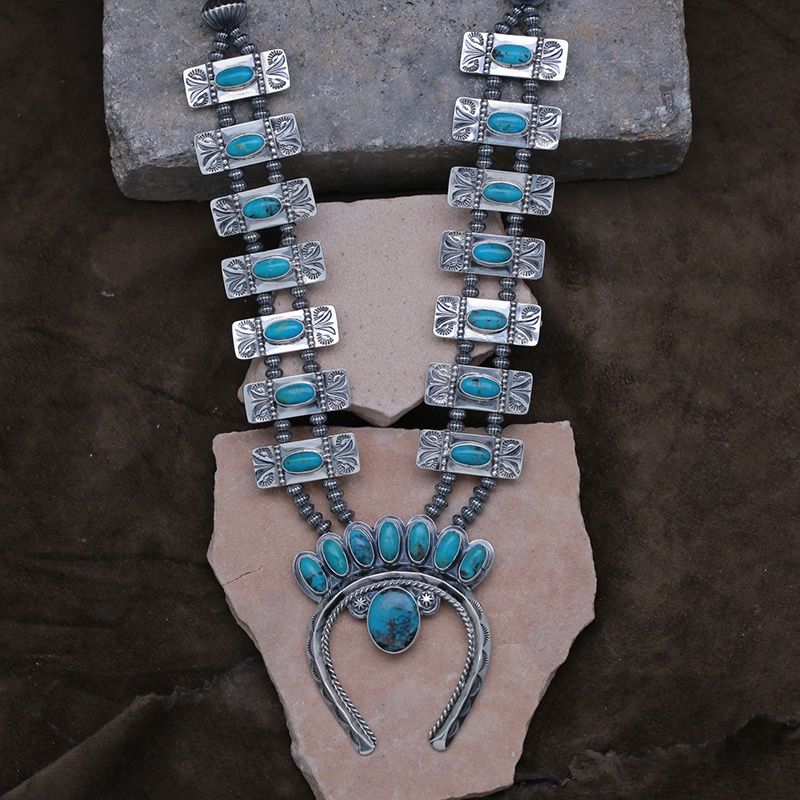 Blue Gem turquoise squash blossom necklace by artist Travis Teller