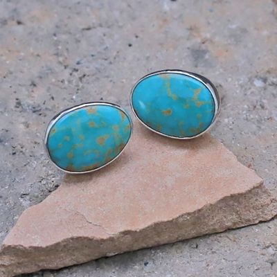 Turquoise cuff links by artist Travis Teller