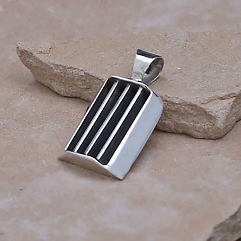 Tom Hawk rectangular pendant