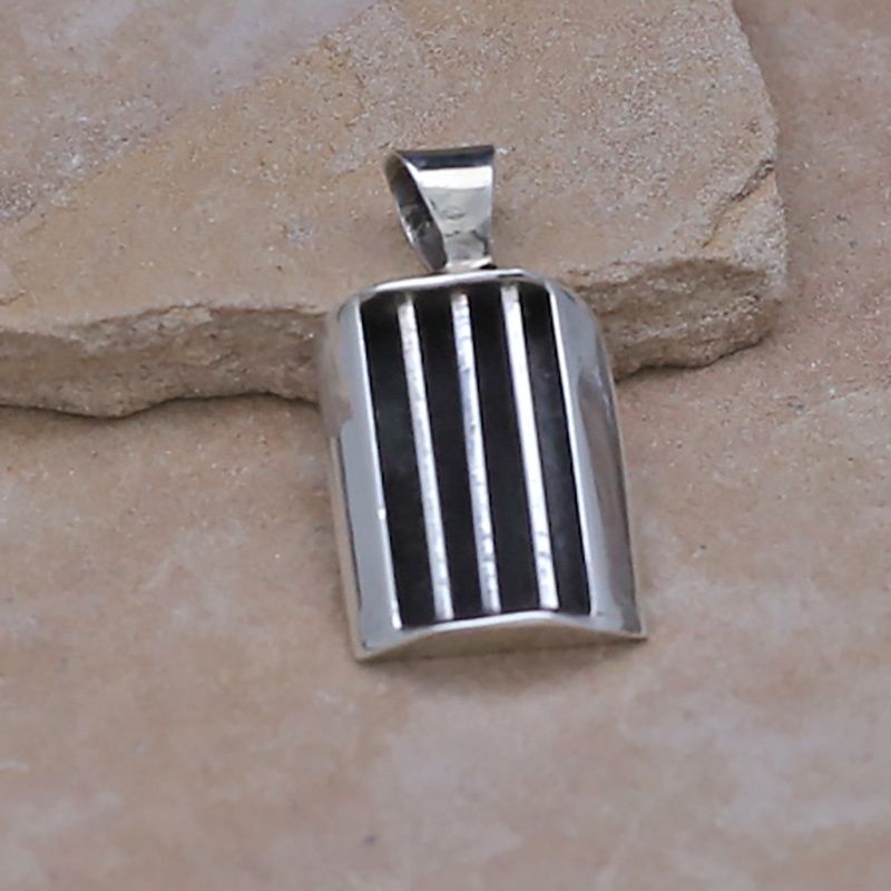 Tom Hawk rectangular pendant