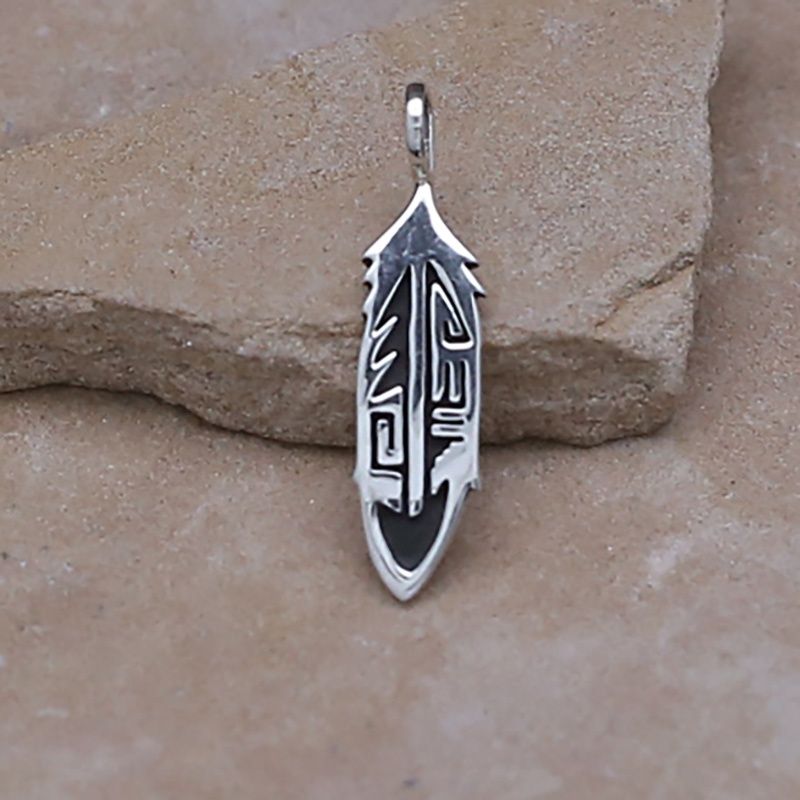 Small feather pendant w/ southwestern overlay style