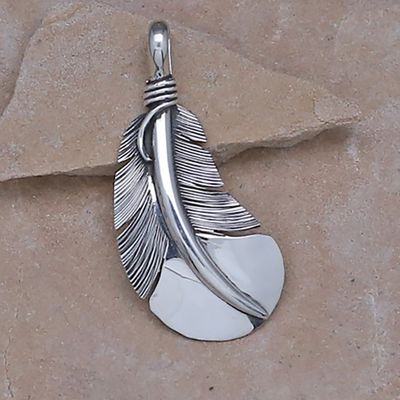 Medium sized curved feather pendant