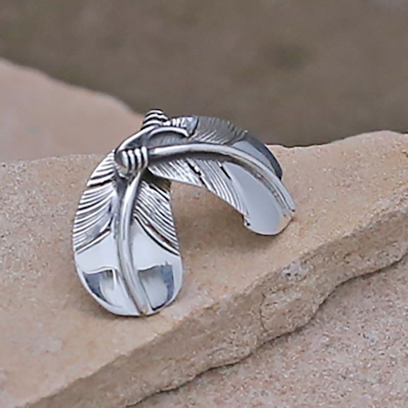 Small curved feather post earring