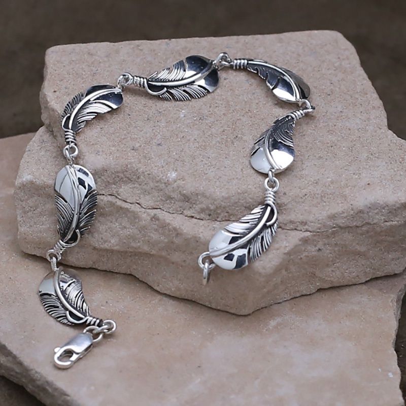 Silver feather link bracelet