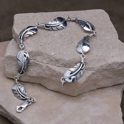 Silver feather link bracelet