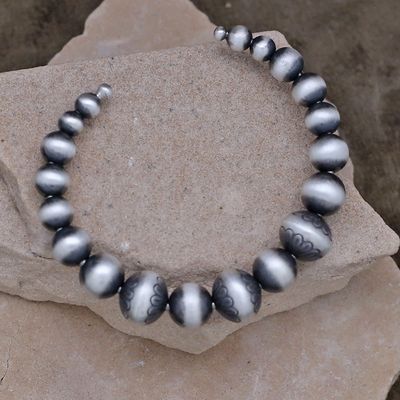 Antiqued silver graduated bead bracelet