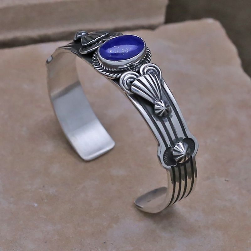 Thin Navajo bracelet w/Lapis by artist  Jeffrey  Nelson