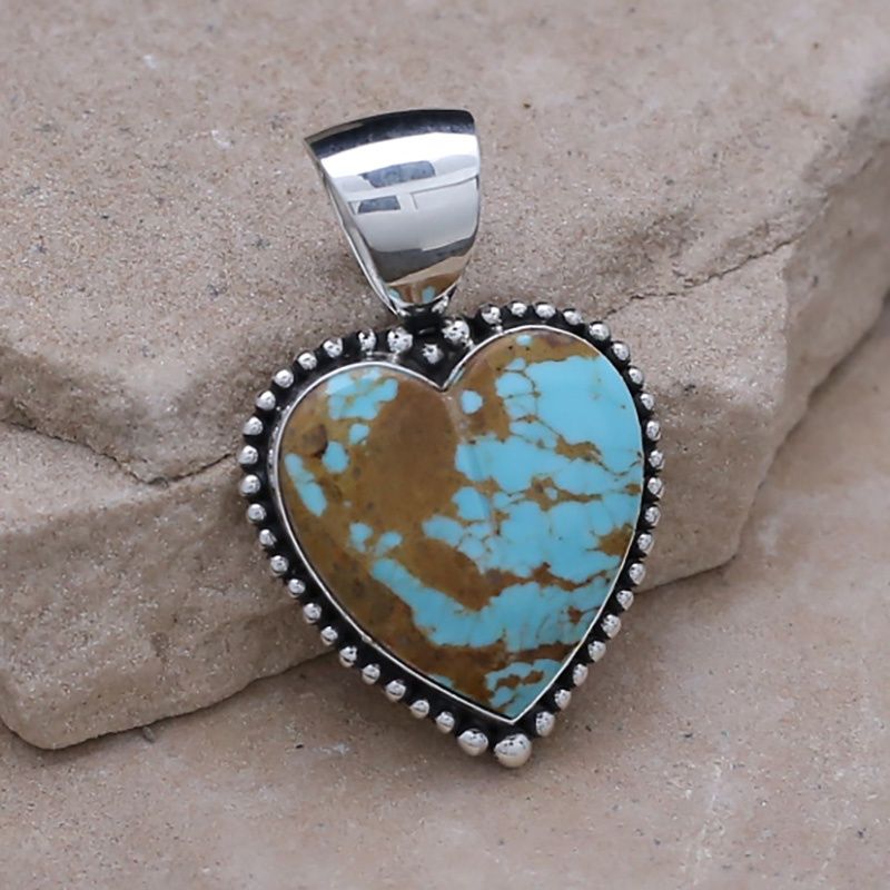 Turquoise heart pendant w/ bead surround