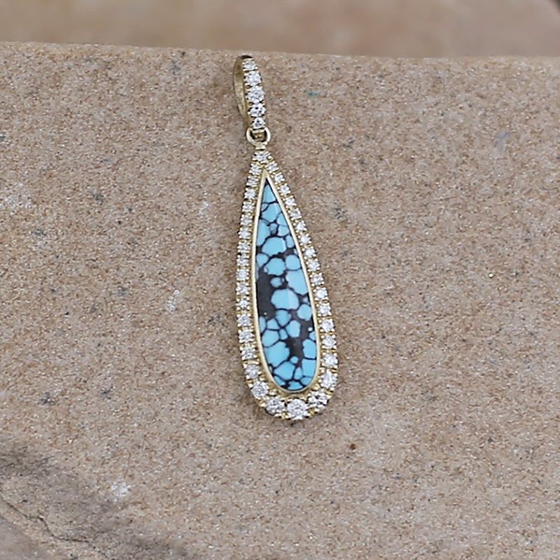 Diamond and spiderweb turquoise pendant