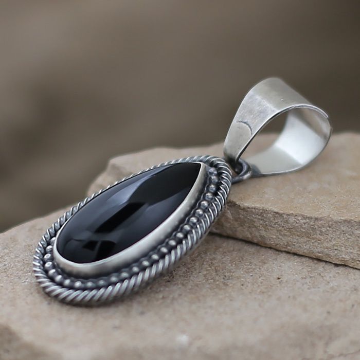 Large tear drop shaped onyx pendant