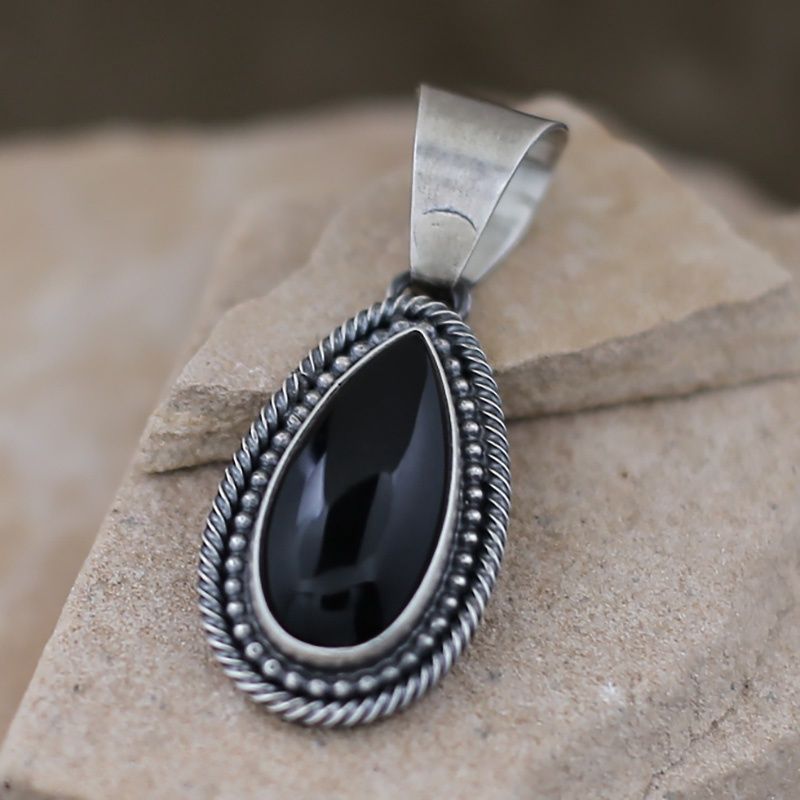 Large tear drop shaped onyx pendant