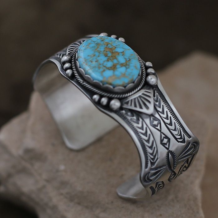 Heavy stamped Navajo bracelet by Mark Yazzie