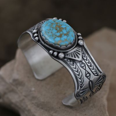 Heavy stamped Navajo bracelet by Mark Yazzie