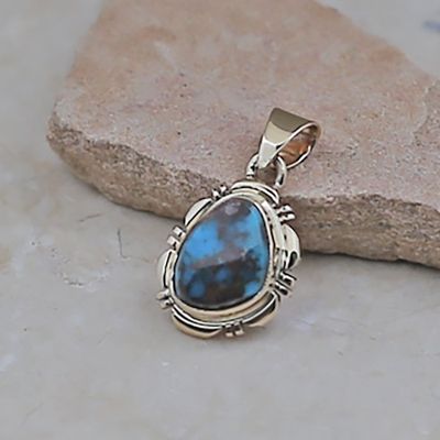 Small 14kt gold Bisbee turquoise pendant by Rick Tolino