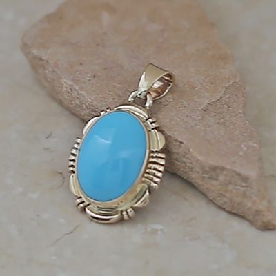 Round 14kt gold Sleeping Beauty turquoise pendant