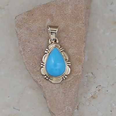 Small 14kt gold Sleeping Beauty turquoise pendant by Rick Tolino