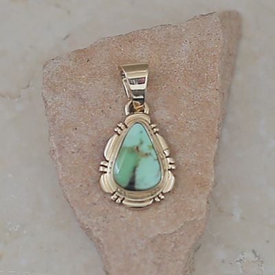 Small 14kt gold pendant w/ Carico Lake turquoise