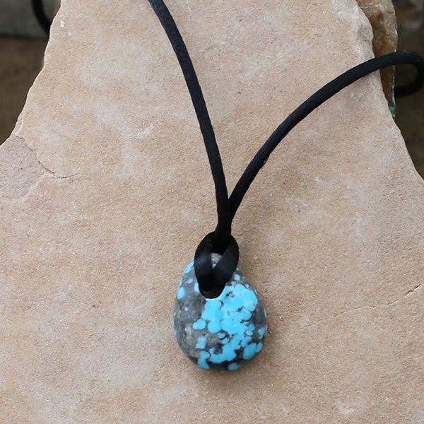 Dark matrix turquoise stone and cord necklace