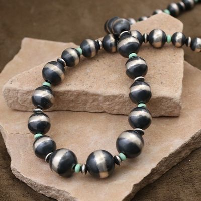 Graduated silver beads w/ green turquoise