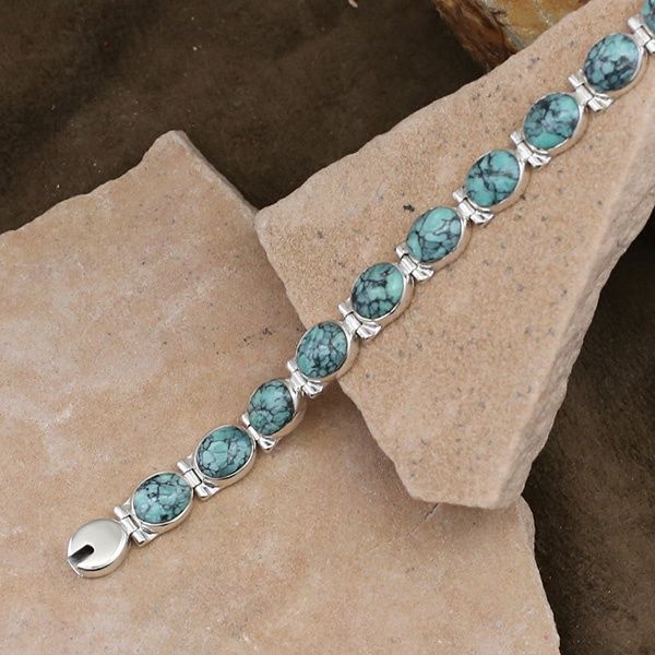 Oval stone link bracelet w/ spiderweb turquoise