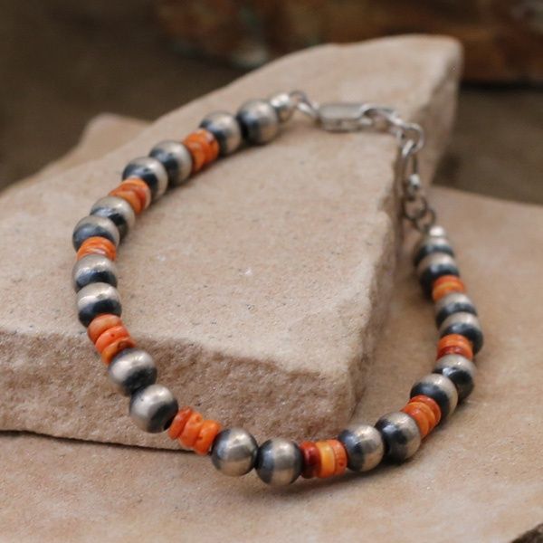 Orange Spiny oyster shell and silver bead bracelet