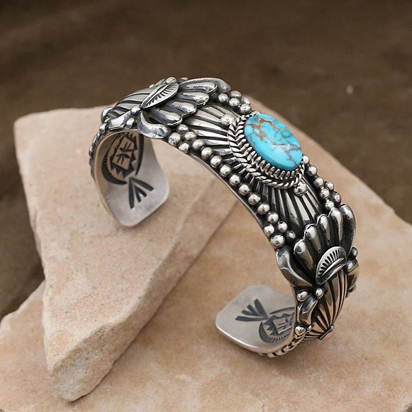 Delbert Gordon cuff bracelet w/ small oval turquoise stone