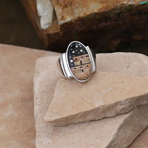 Small oval inlay ring w/ Adobe Pueblo design