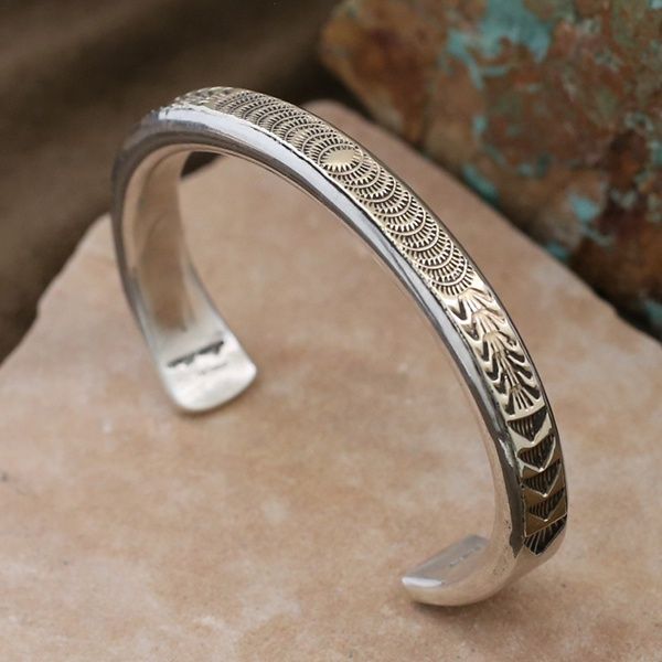 Marc Antia heavy wire bracelet- gold & silver
