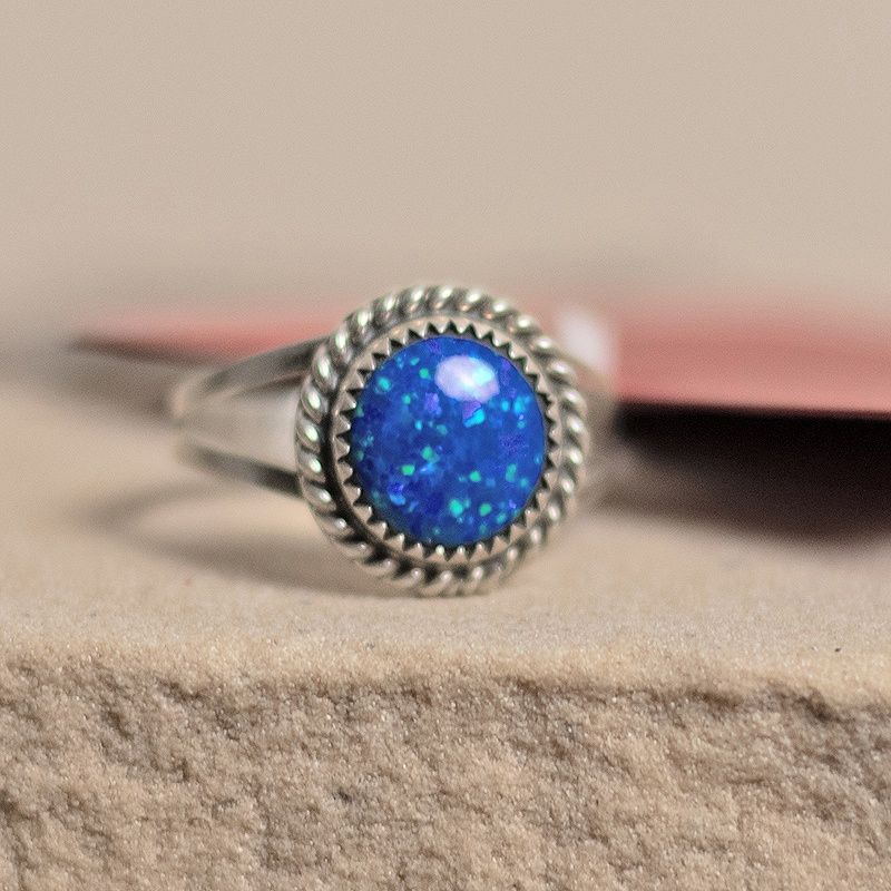 Round dark blue cultured opal ring w/ split wire shank