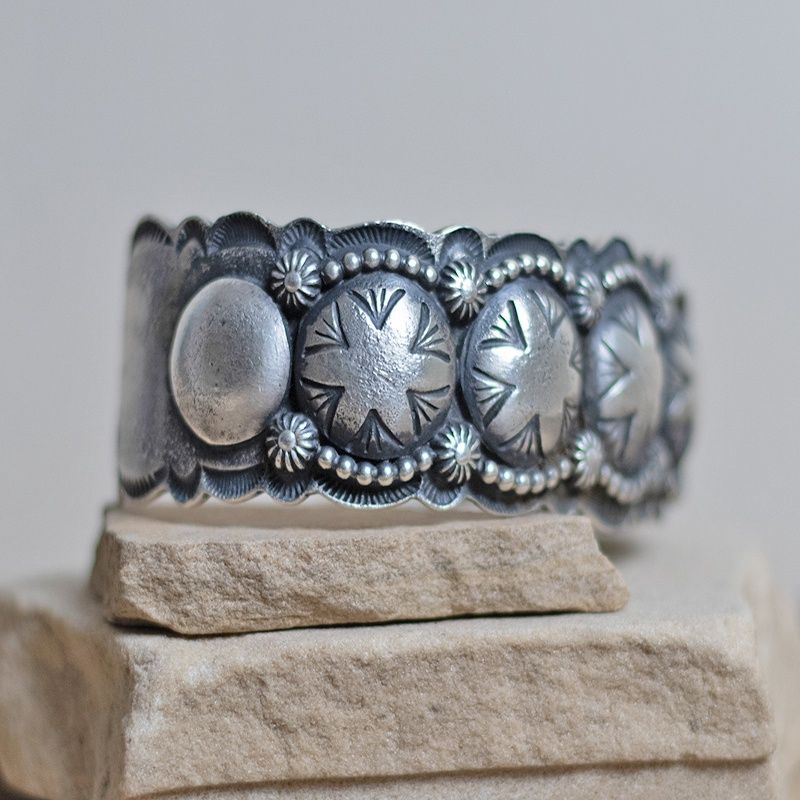 Heavy silver bracelet w/ detailed stamping