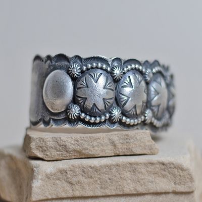 Heavy silver bracelet w/ detailed stamping