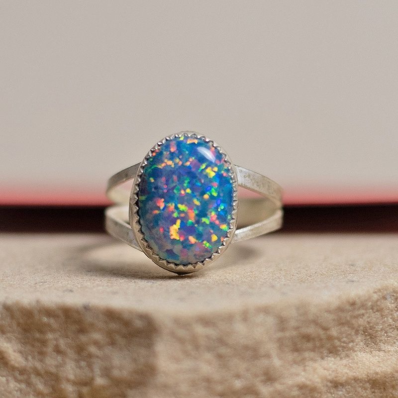Oval blue cultured opal ring w/ split wire shank