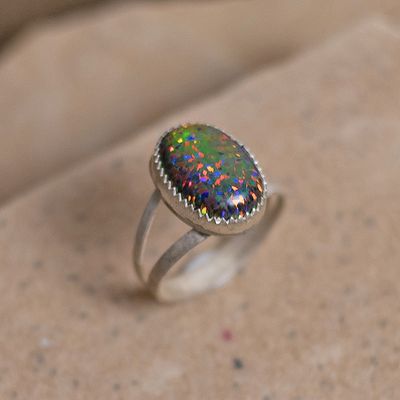 Oval dark orange cultured opal ring w/ split wire shank