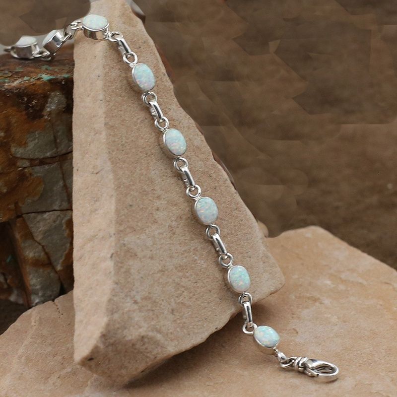 Small oval link bracelet w/ white cultured opal