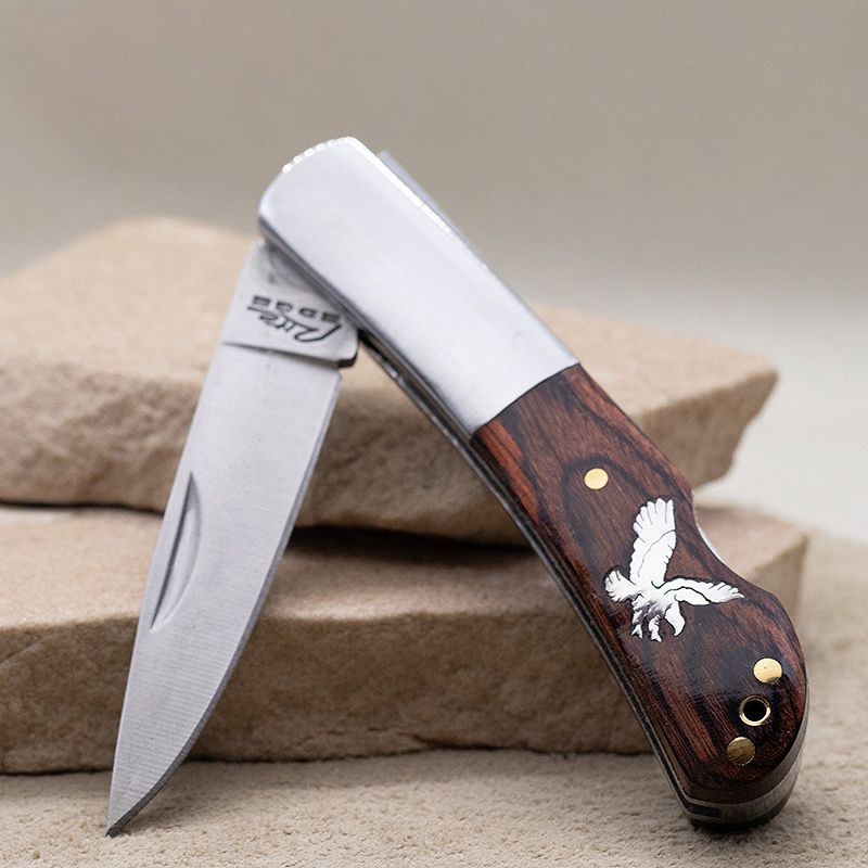 Pocket knife w/silver inlay flying eagle