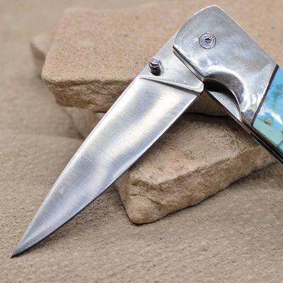 Custom folding knife with Sonoran gold turquoise