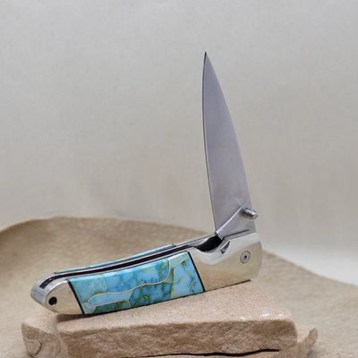 Custom folding knife with Sonoran gold turquoise