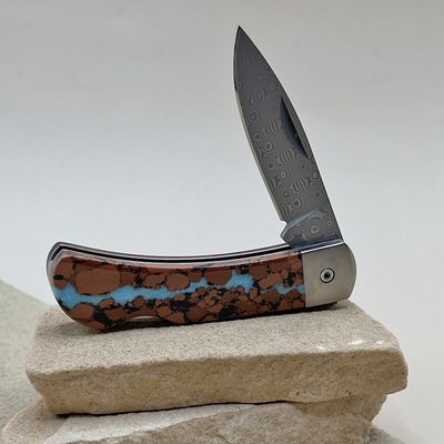 Damascus blade pocket knife with boulder turquoise inlay