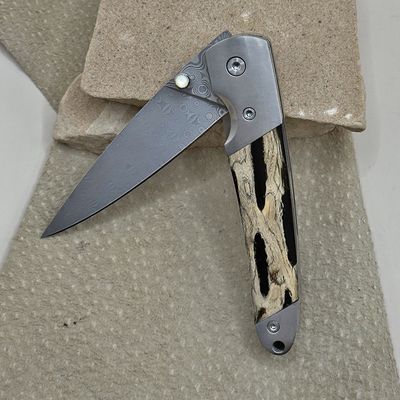 Cholla &amp; black resin inlay folding knife-Damascus