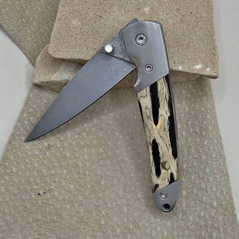 Cholla &amp; black resin inlay folding knife-Damascus