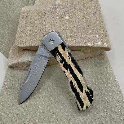 Damascus blade pocket knife w/ cholla wood