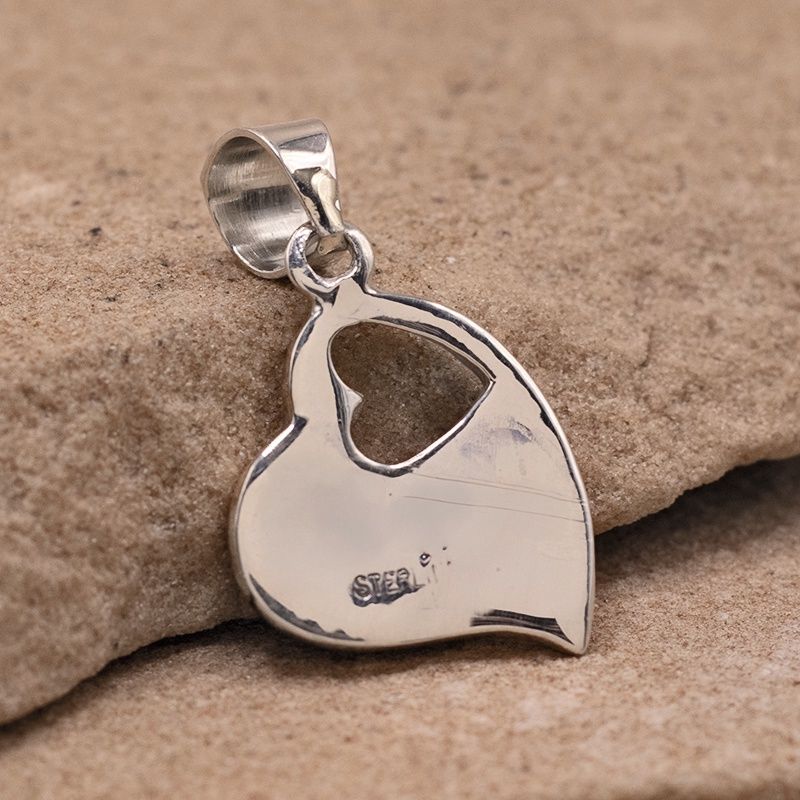 Double heart pendant w/ turquoise inlay