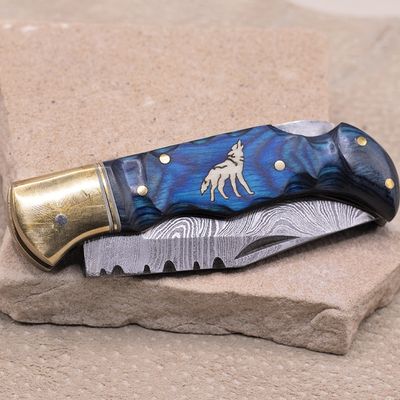 Blue wood inlay knife w/wolf-Damascus