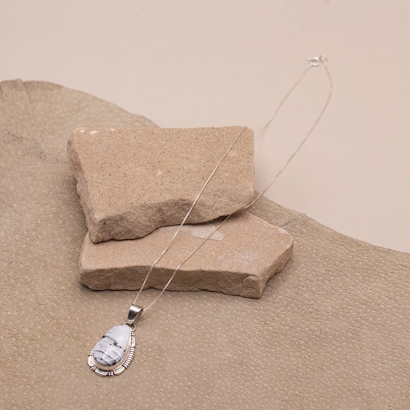 White Buffalo Tear Drop Pendant with Saw Cut Details