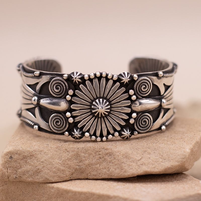 Intricate Silver Cuff Bracelet by Delbert Gordon
