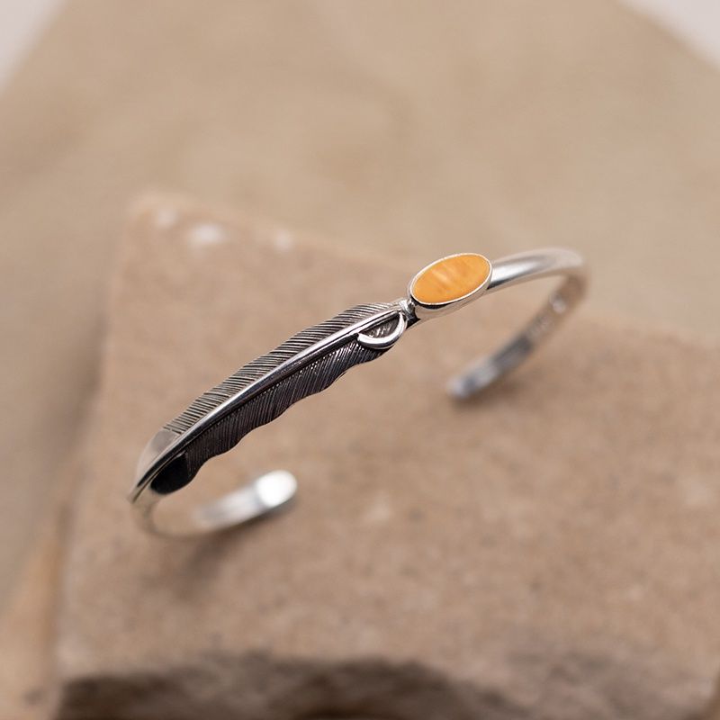 Thin feather bracelet w/ orange spiny oyster
