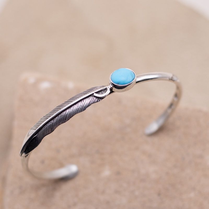 Thin feather bracelet w/ turquoise